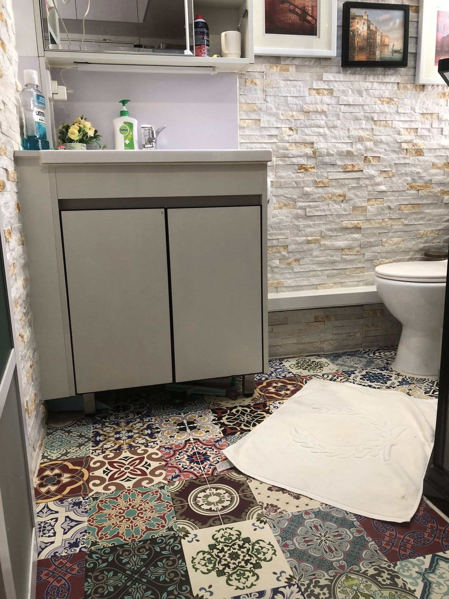 May be an image of towel rack, sink and indoors