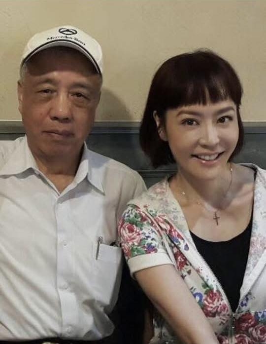 May be an image of 2 people, people smiling and text