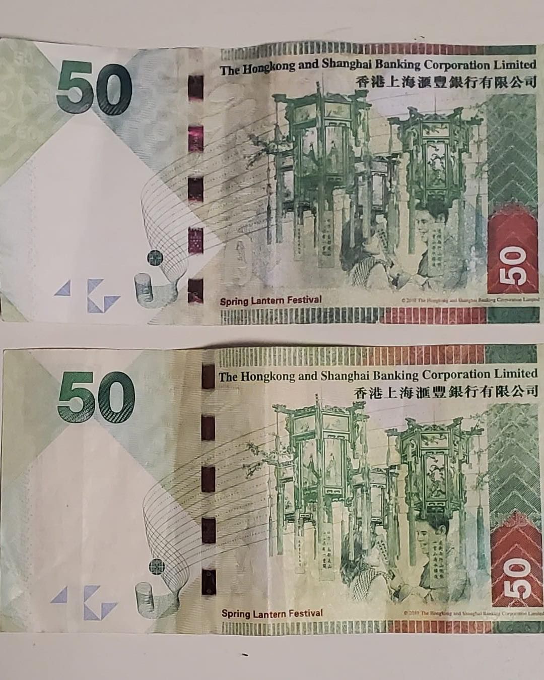 的士中招收假「50元」紙幣。(FB@騰駿的士管理公司)