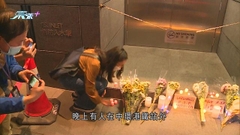 中環晚上有人聚集悼念烏魯木齊火警死者