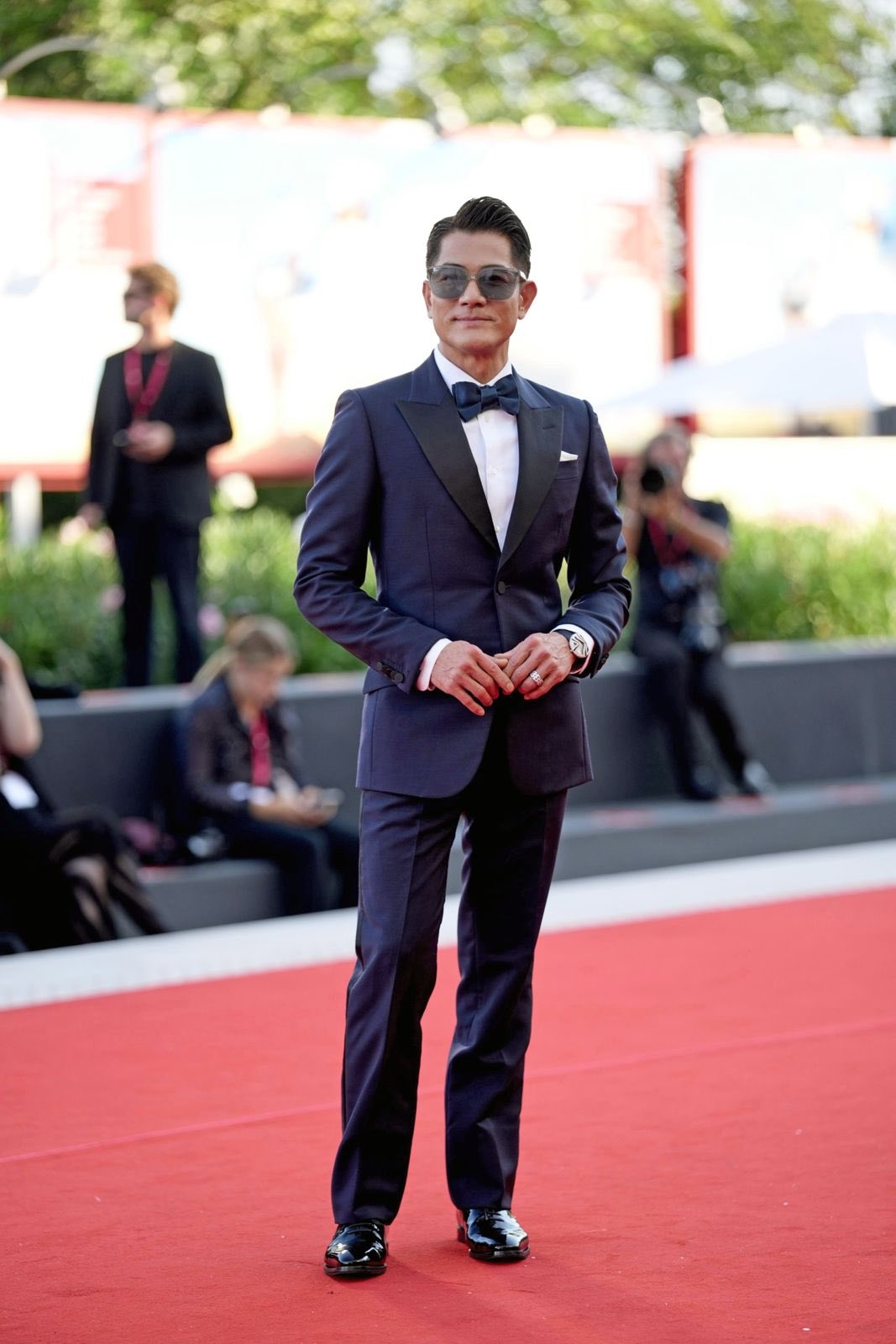 May be an image of 5 people and suit