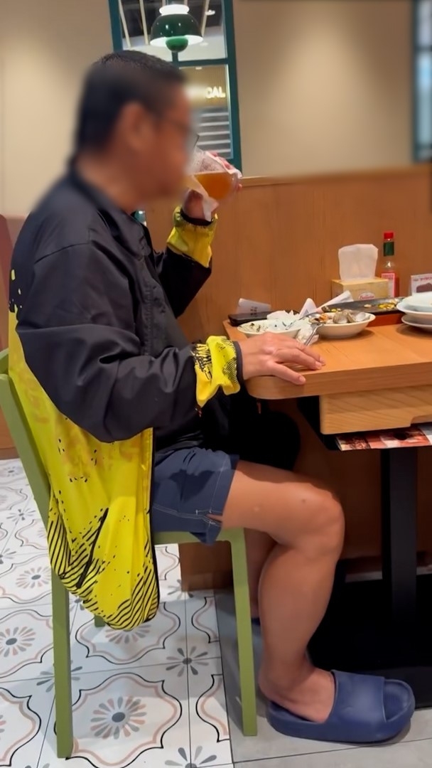 影片顯示，涉事阿叔疑正在餐廳內飲自攜啤酒。（Threads影片截圖／hobbitsharon）