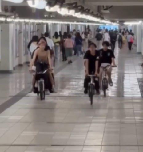 紅磡站隧道內「後生街車黨」踩單車大聲放音樂　網民意見不一