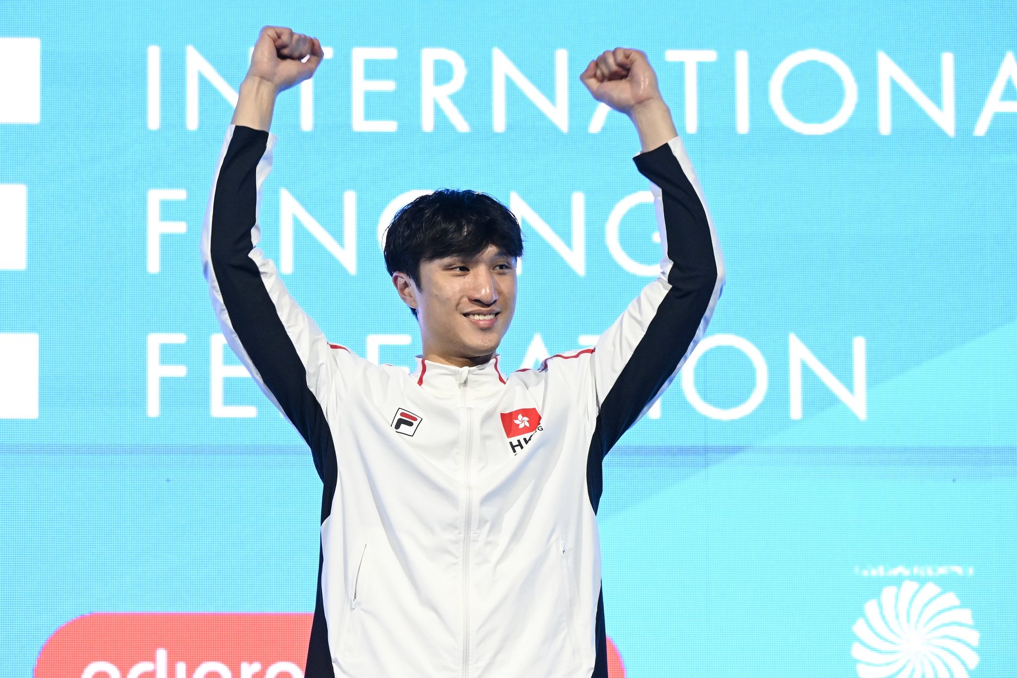 May be an image of 1 person and text that says 'IN INERN, TERNATIONA TIONA F NONG N FE ON H'