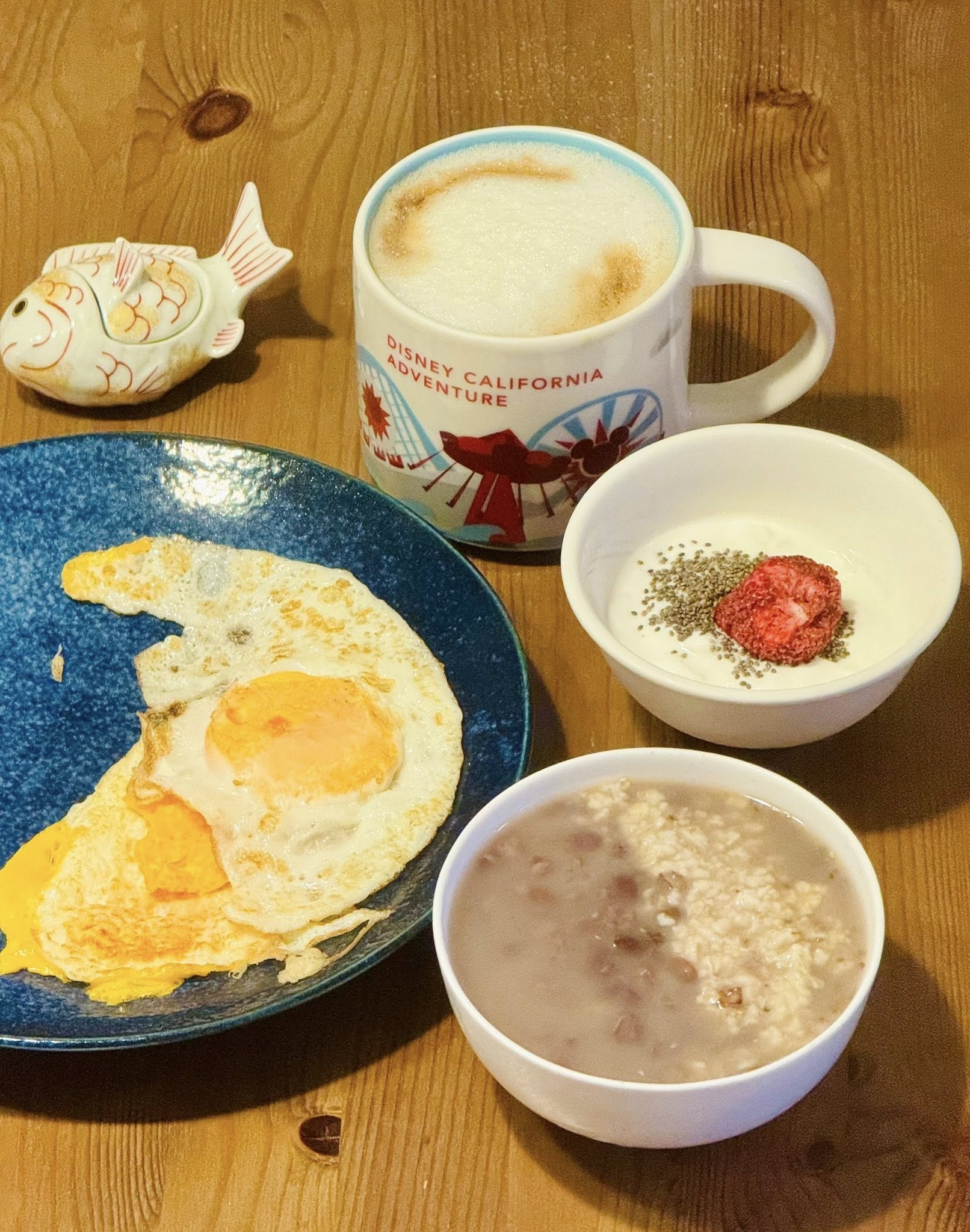 May be an image of congee, oats and text that says 'ADV DISNEY DISNEY CALIFORNIA OVENTURE ENTURE INEYCALIFORNIA N URE ENT'