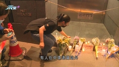 昨晚有人中環聚集悼念烏魯木齊火警死者 一名男子涉普通襲擊被捕
