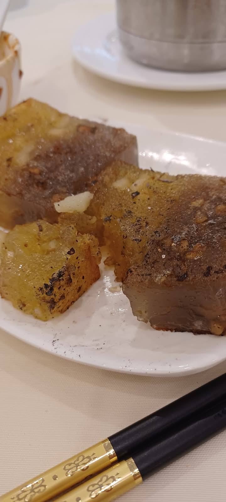 May be an image of dim sum and congee