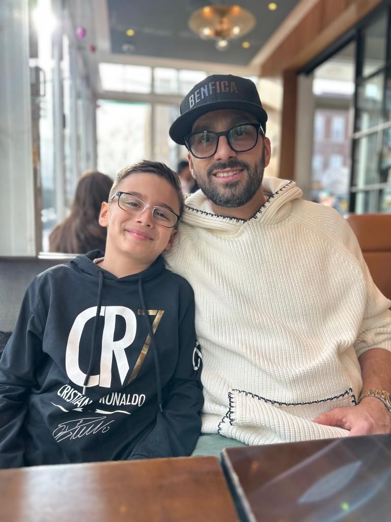 Andre Rodrigues with his son