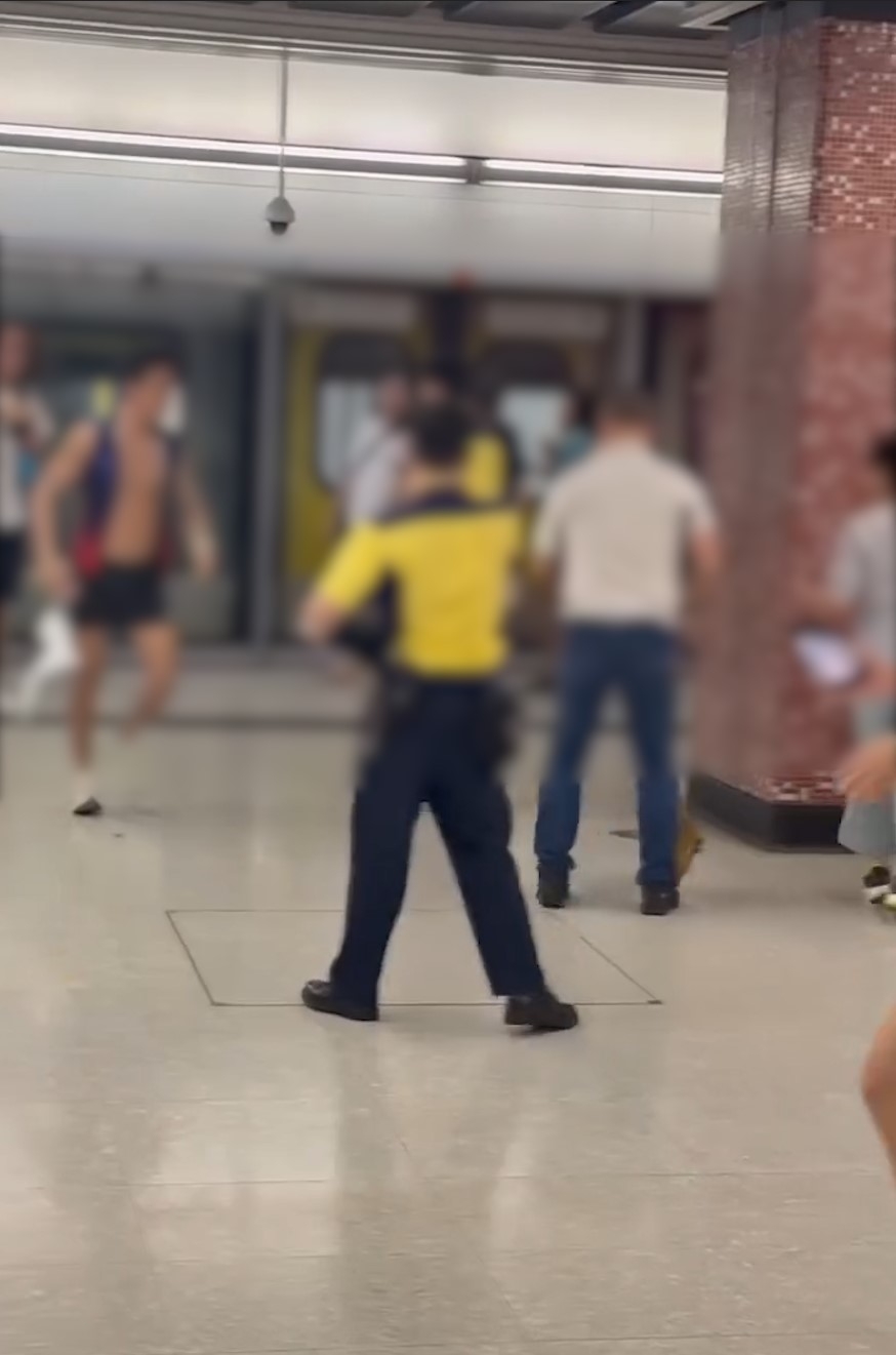 紅磡站MMA｜兩男月台肉搏兼吐口水職員霸氣調停　疑因扶手電梯爭路