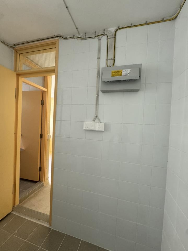 May be an image of water heater and light switch