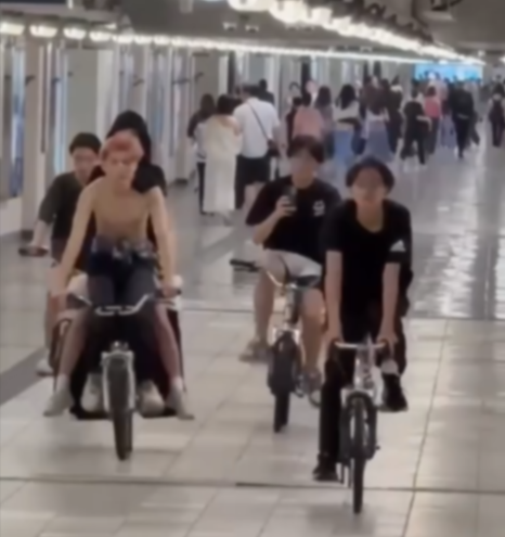 紅磡站隧道內「後生街車黨」踩單車大聲放音樂　網民意見不一