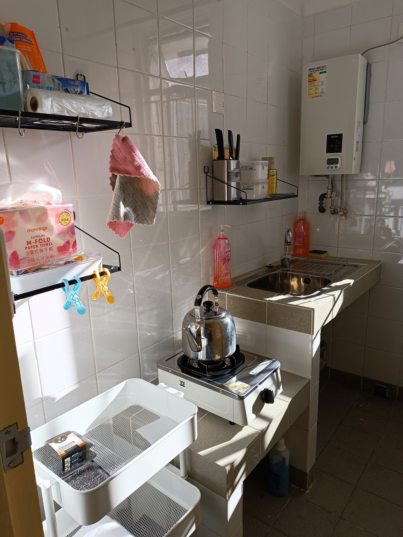 May be an image of sink, towel rack and indoors