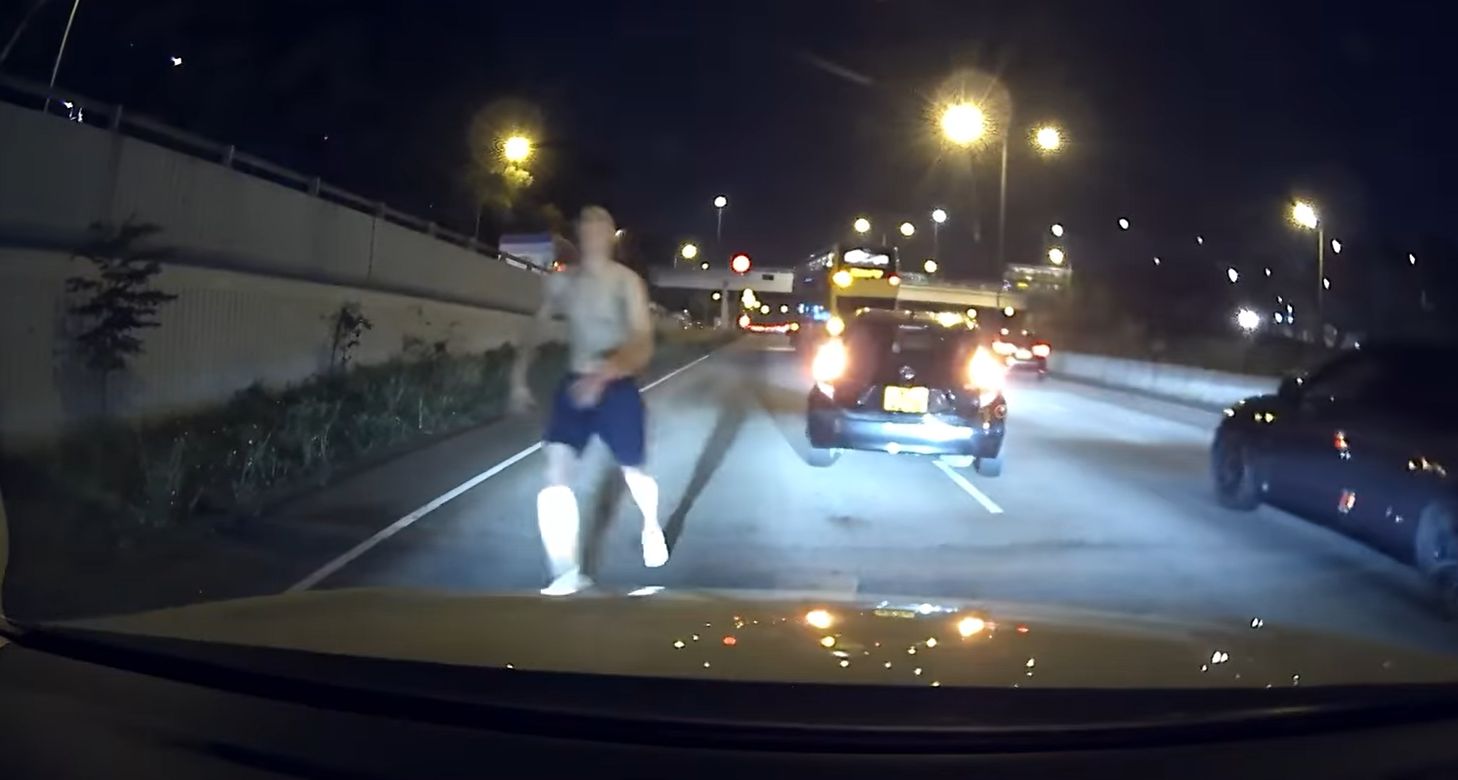 車Cam直擊｜赤膊男反轉吐露港公路突落的士狂奔