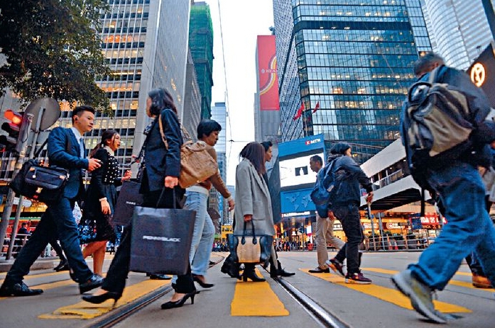 香港打工仔工時全球最長巴黎上班族最嘆-香港商报